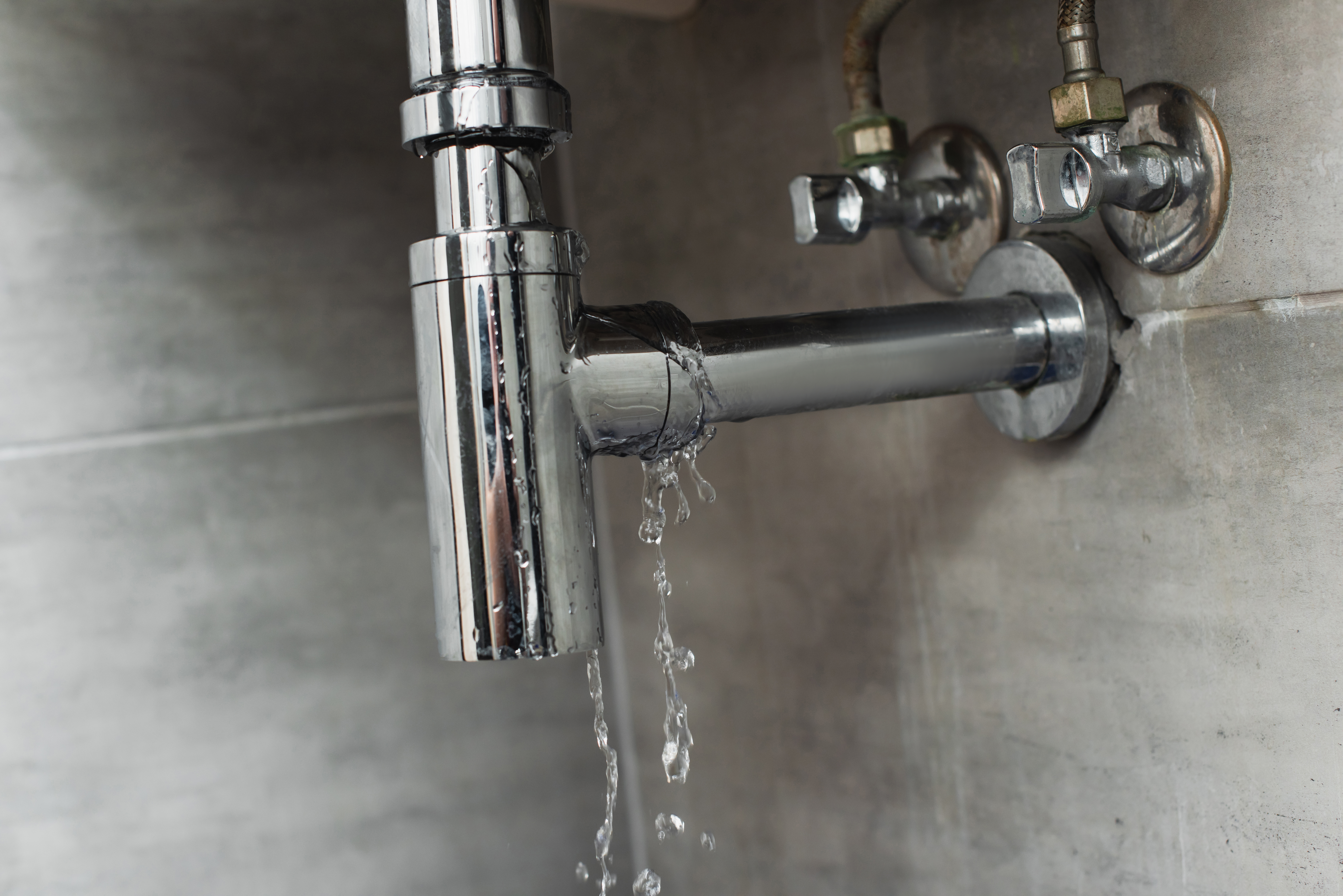 Leaking pipe repair under a basin